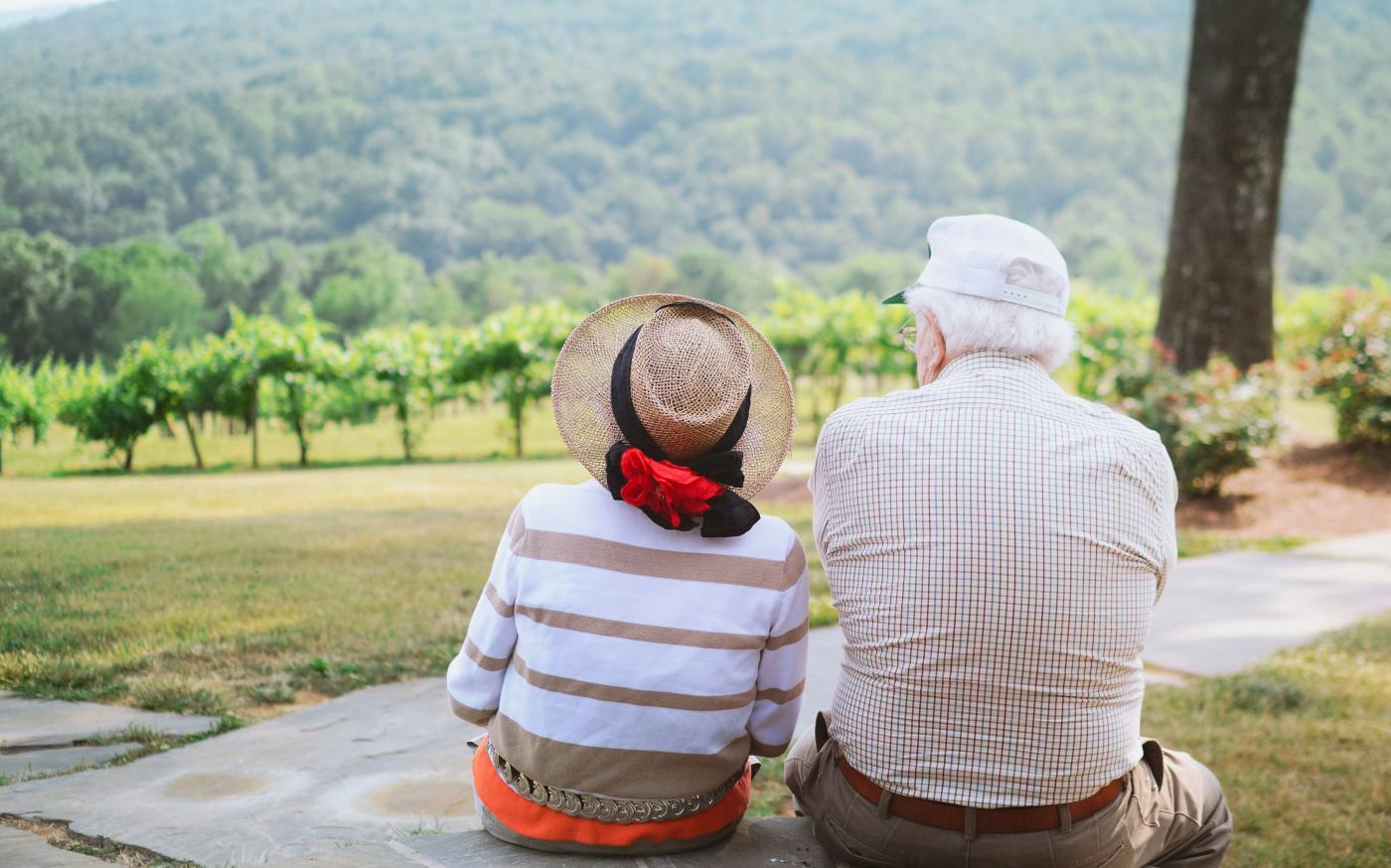 couple sitting on pathway by Christian Bowen courtesy of Unsplash.