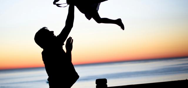 silhouette of man throwing girl in air by lauren lulu taylor courtesy of Unsplash.